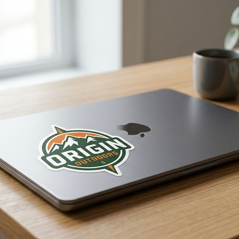 Die cut vinyl logo sticker on laptop for branding